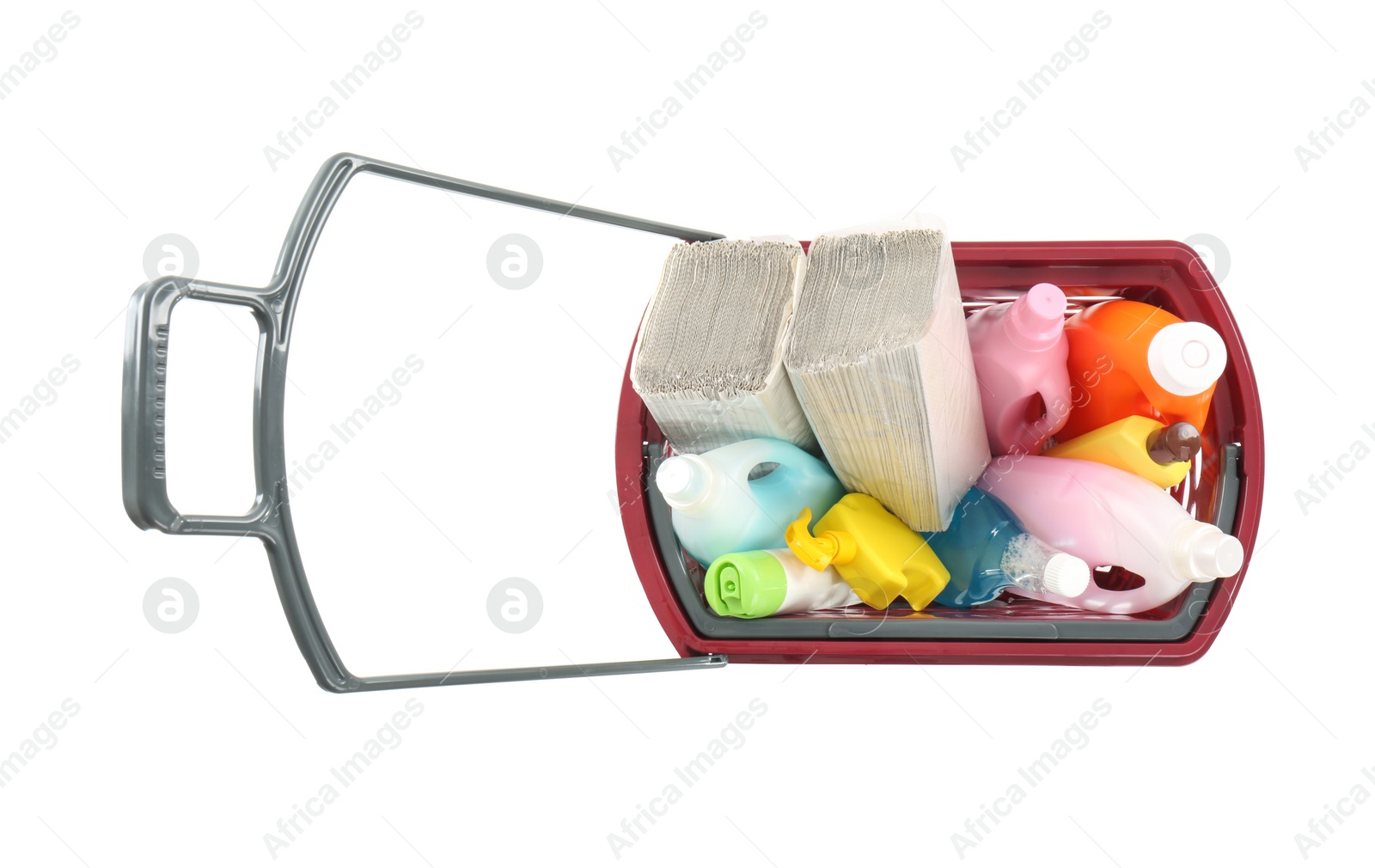 Photo of Shopping basket full of cleaning supplies isolated on white, top view