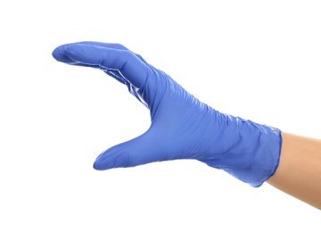 Photo of Woman in blue latex gloves holding something on white background, closeup of hand