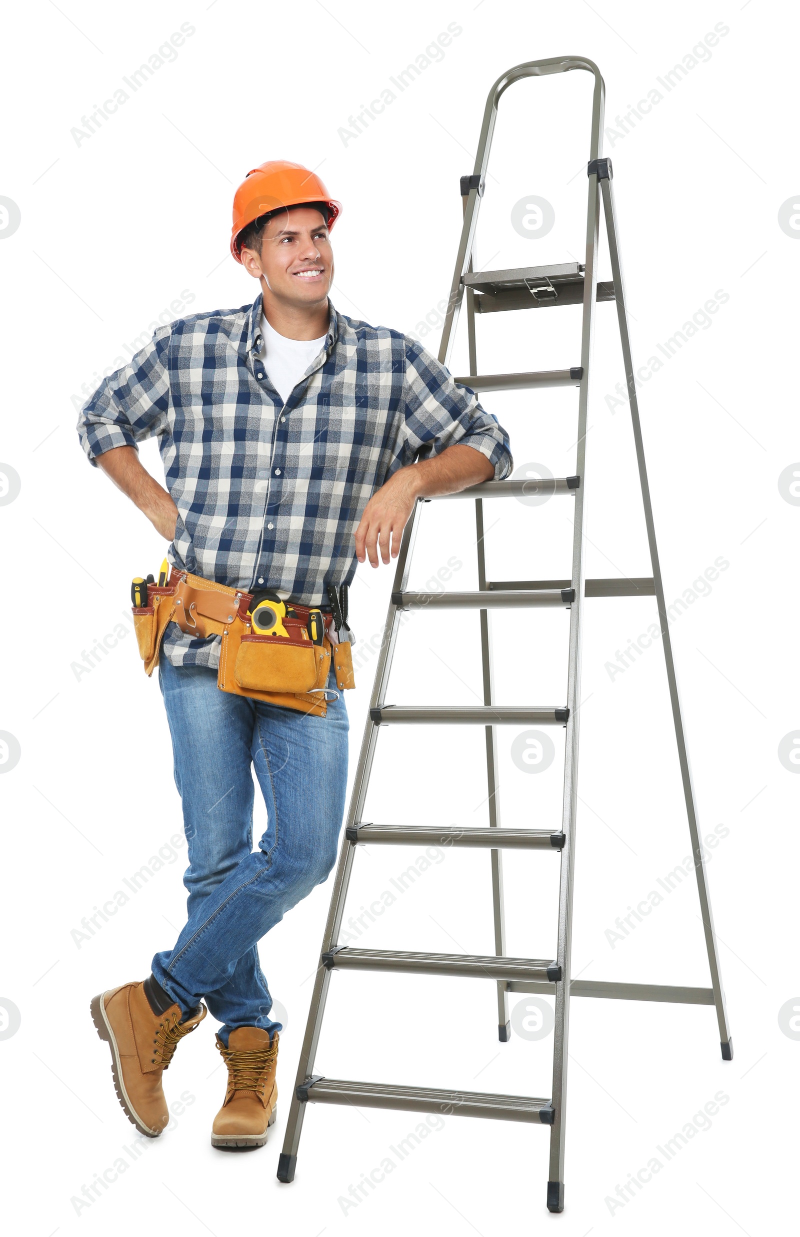 Photo of Professional builder near metal ladder on white background