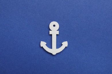 Anchor figure on blue background, top view