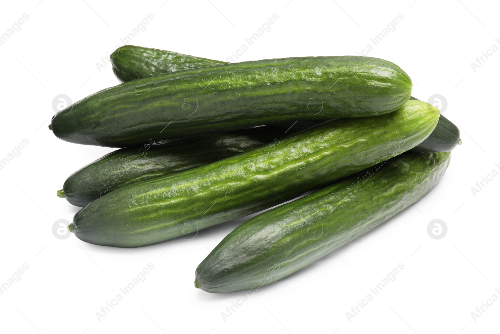 Photo of Many long fresh cucumbers isolated on white