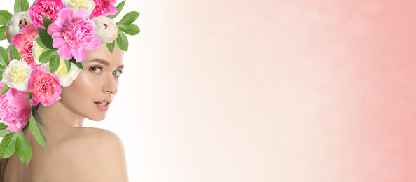 Image of Young woman with beautiful makeup wearing flower wreath on pink background, space for text. Banner design