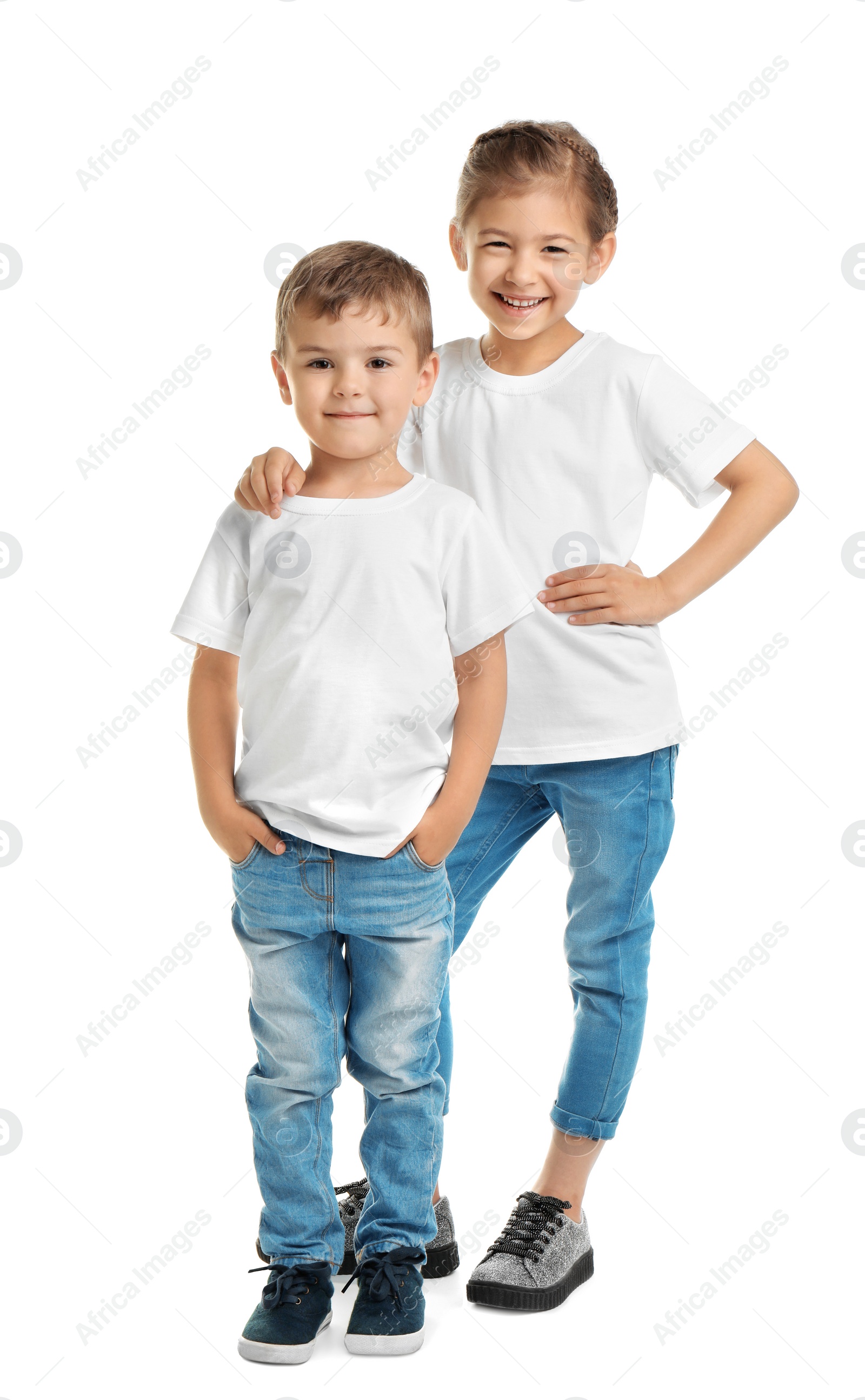 Photo of Little kids in t-shirts on white background. Mockup for design