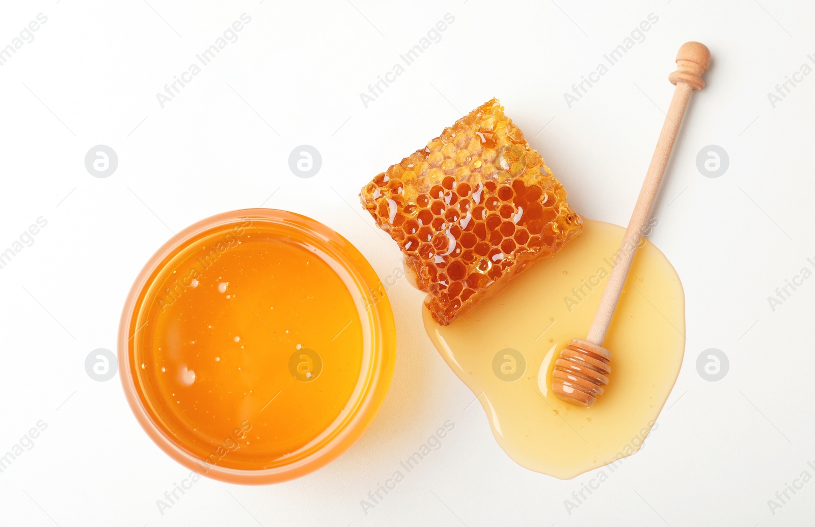 Photo of Composition with fresh honey on white background, top view