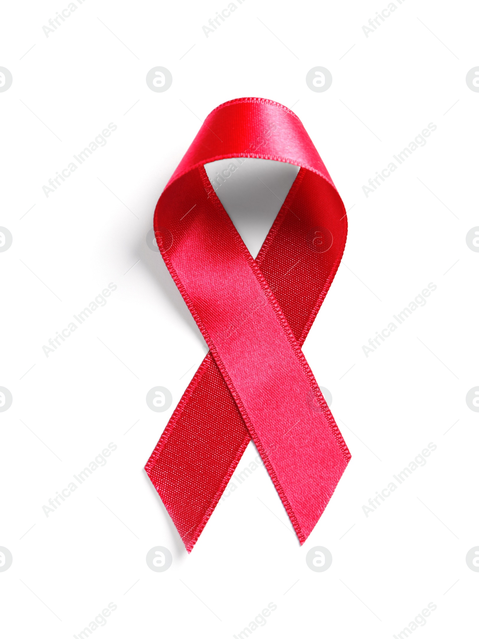 Photo of Pink ribbon on white background, top view. Cancer awareness