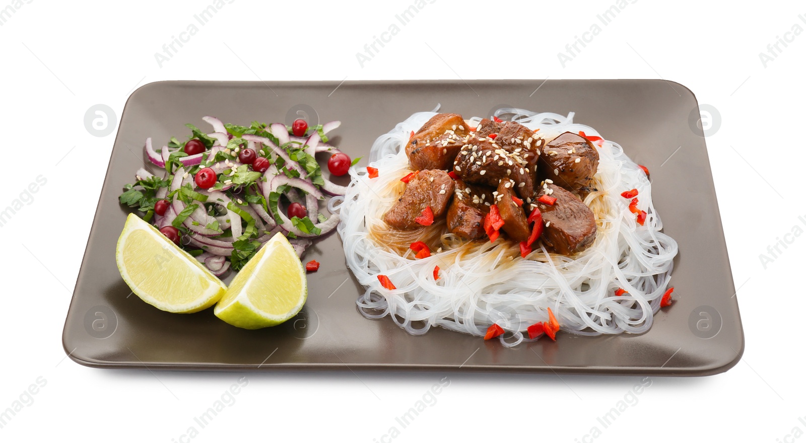 Photo of Pieces of soy sauce chicken with noodle, salad and lime isolated on white
