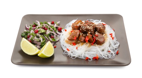 Pieces of soy sauce chicken with noodle, salad and lime isolated on white