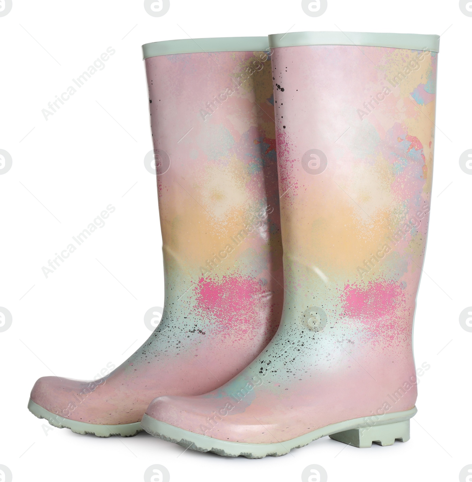 Photo of Modern colorful rubber boots isolated on white