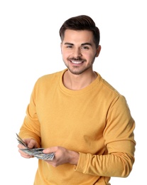 Portrait of happy young man with money on white background