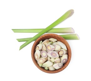 Photo of Whole and cut fresh lemongrass on white background, top view