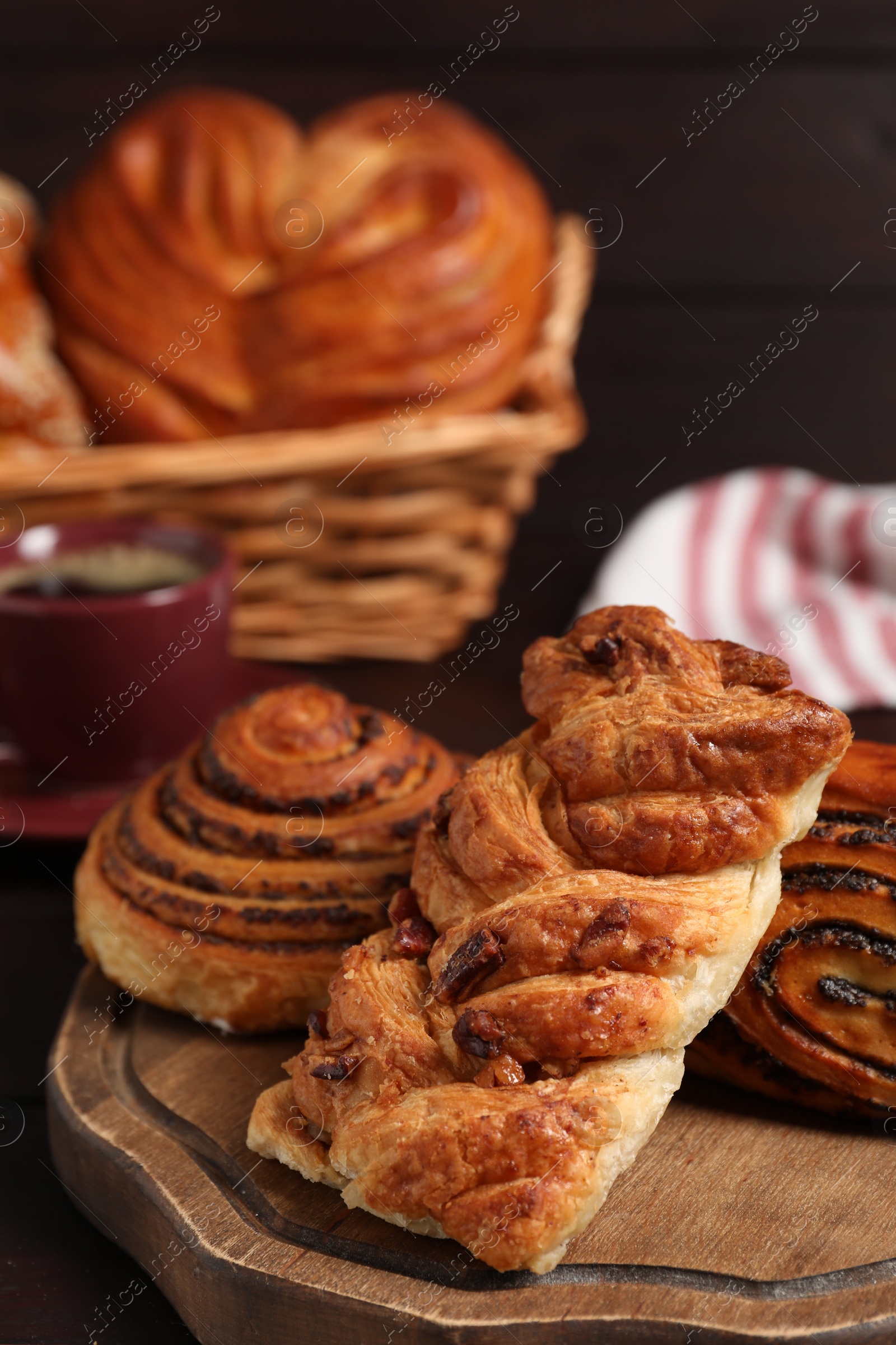 Photo of Different tasty freshly baked pastries on table, closeup