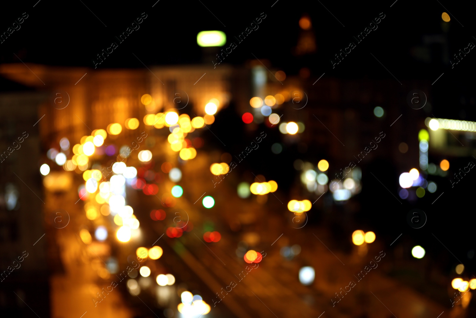 Photo of Blurred view of beautiful city at night. Bokeh effect