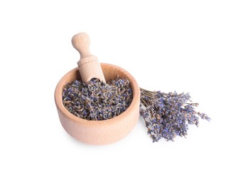 Photo of Wooden bowl, scoop and bunch of dry lavender isolated on white