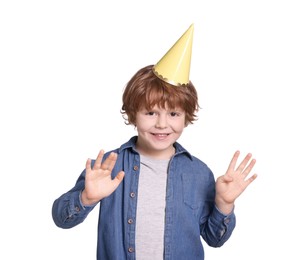 Birthday celebration. Cute little boy in party hat on white background