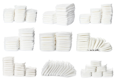 Image of Set of baby diapers on white background