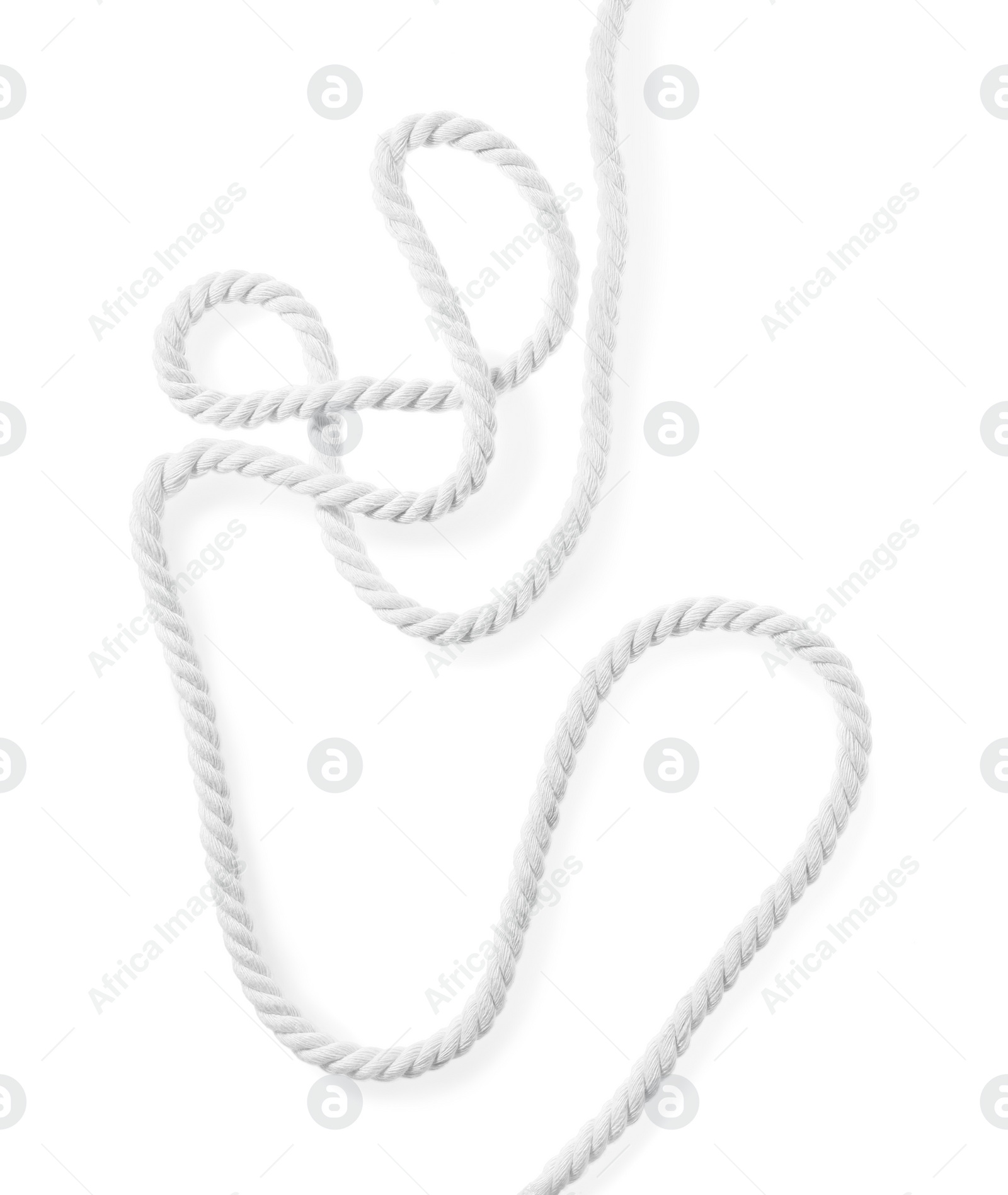 Photo of Hemp rope isolated on white. Natural material