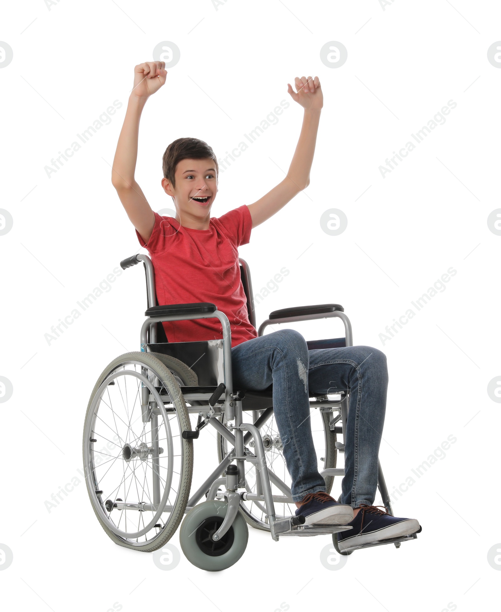 Photo of Emotional teen boy in wheelchair on white background