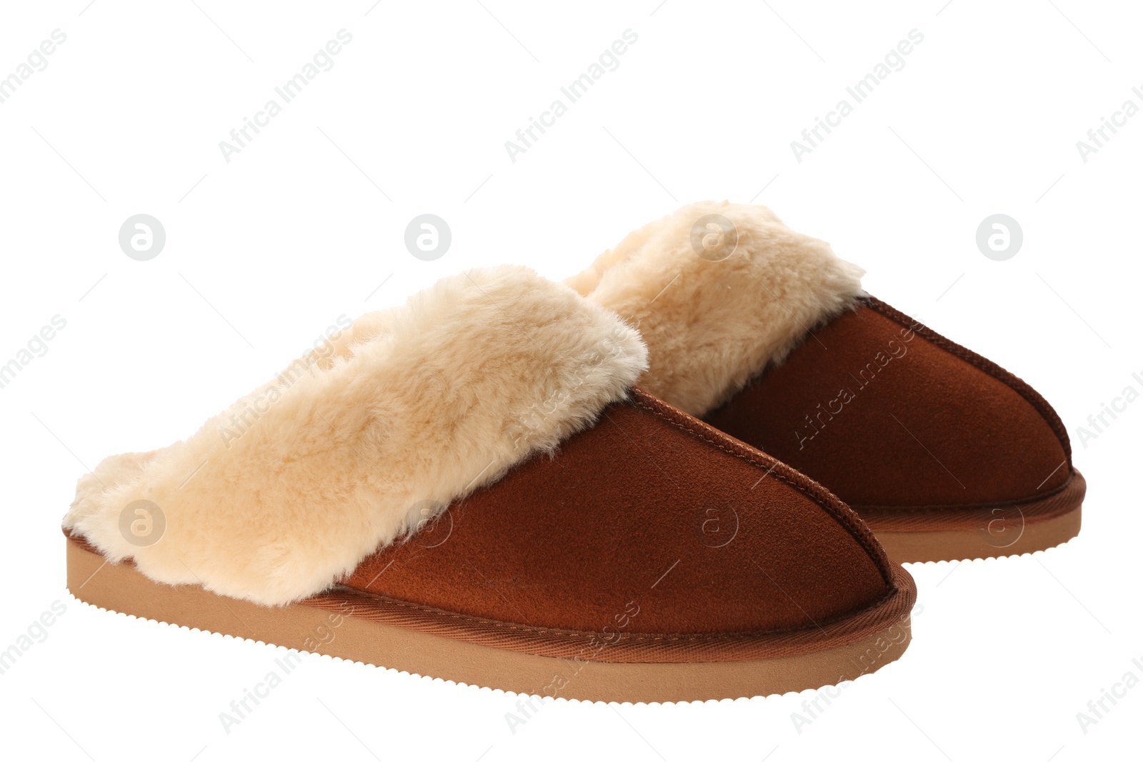 Photo of Pair of stylish soft slippers on white background