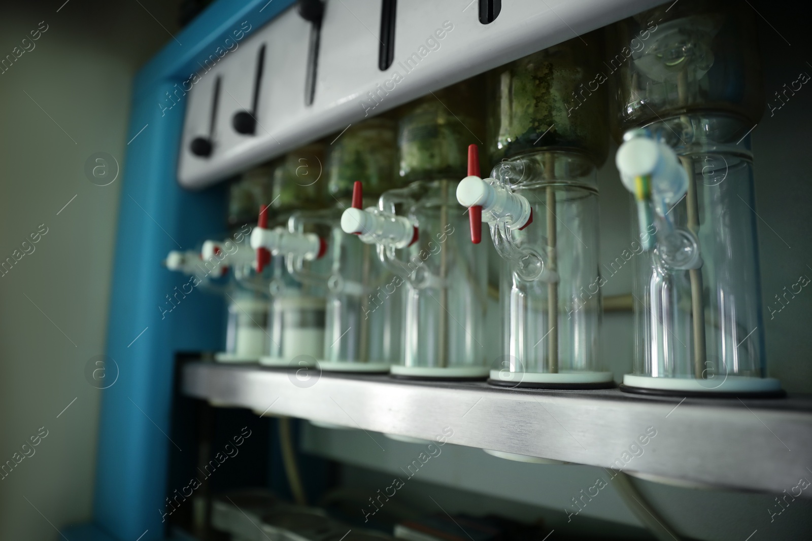 Photo of Solvent extraction system for grain samples in modern laboratory, closeup