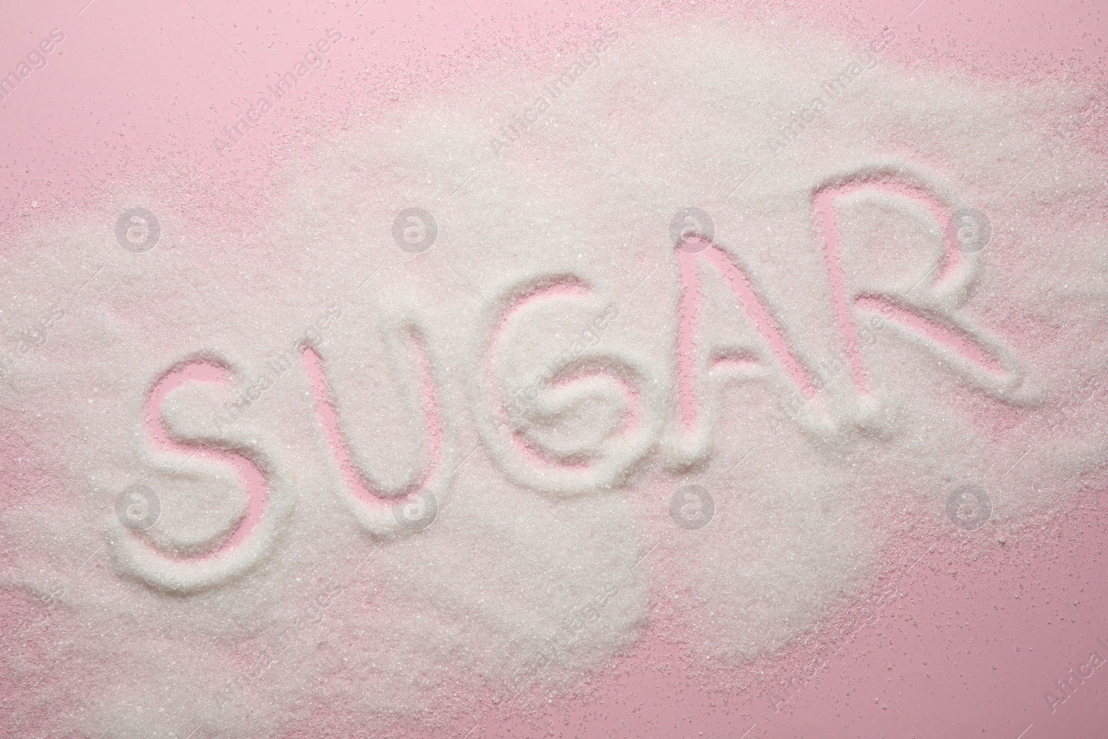 Photo of Composition with word SUGAR on pink background, top view