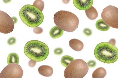 Image of Delicious exotic kiwi fruits flying on white background