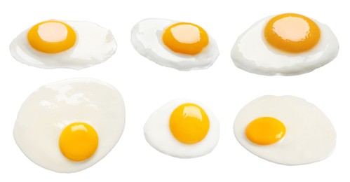 Set with tasty fried eggs on white background