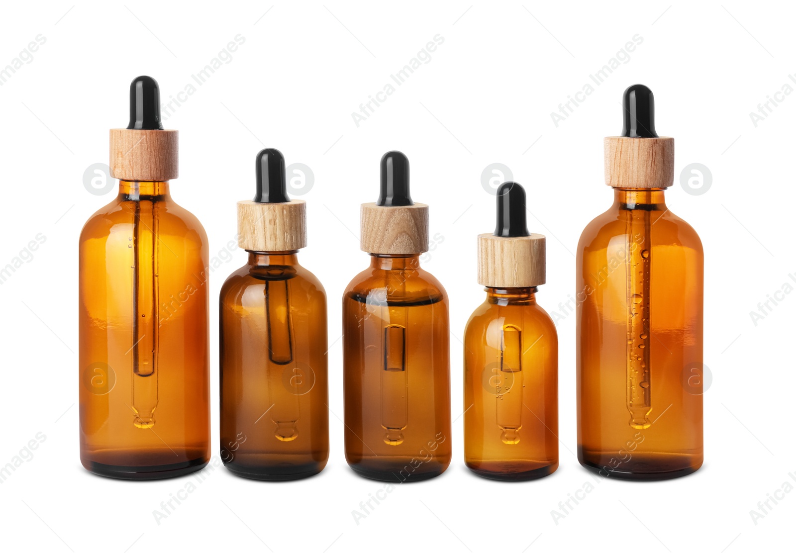 Photo of Row with different bottles of essential oil on white background