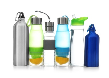 Photo of Different water bottles for sports on white background