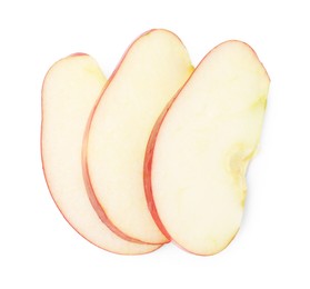 Photo of Slices of ripe red apple isolated on white, top view