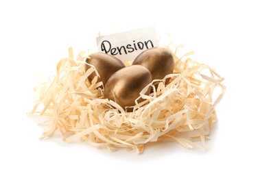 Photo of Golden eggs and card with word PENSION in nest on white background