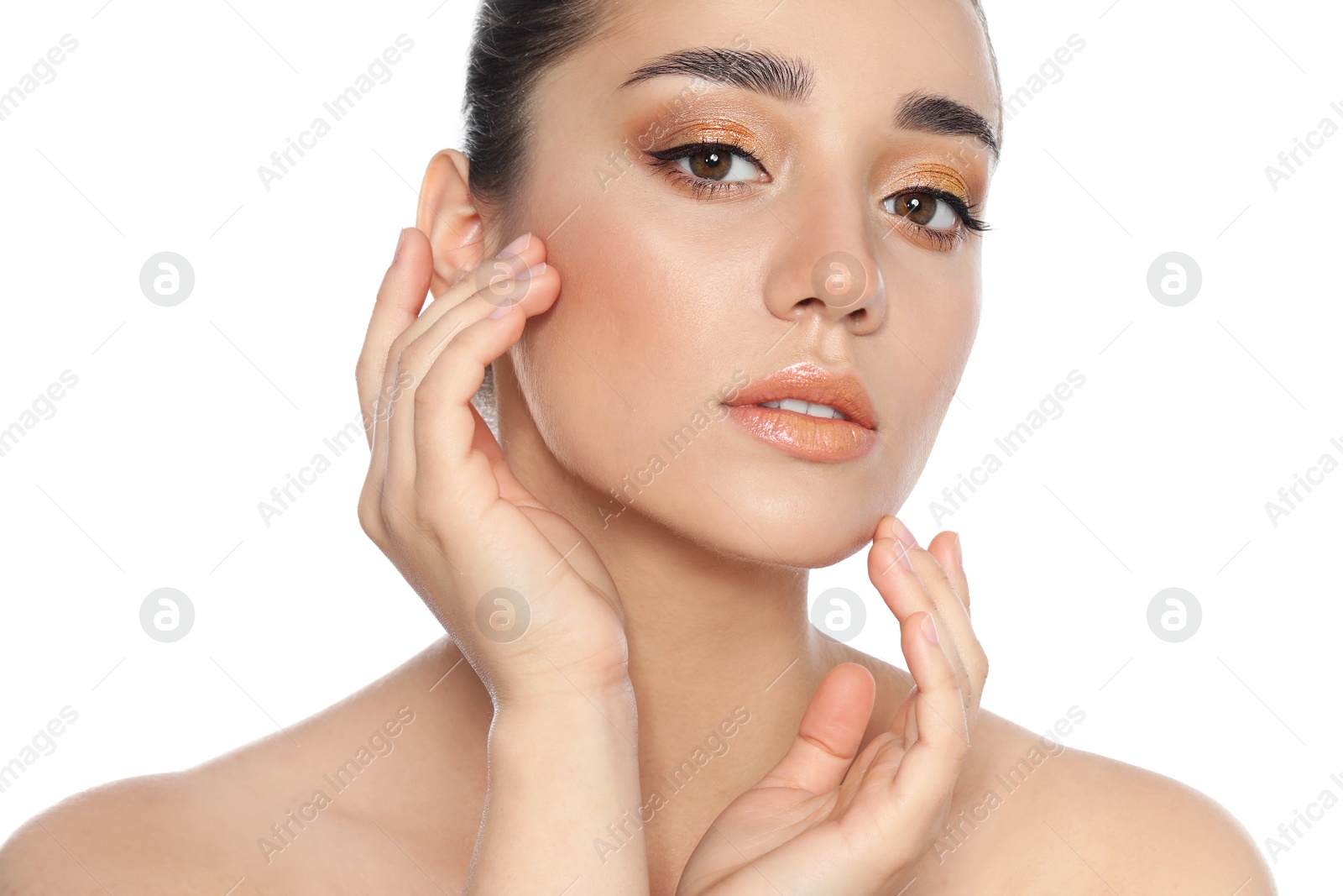 Photo of Beautiful young woman with glitter makeup on white background