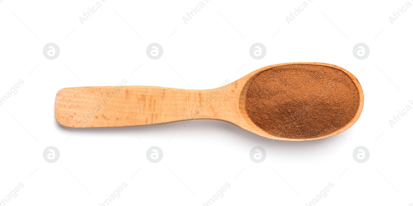 Photo of Wooden spoon with cinnamon powder on white background. Different spices