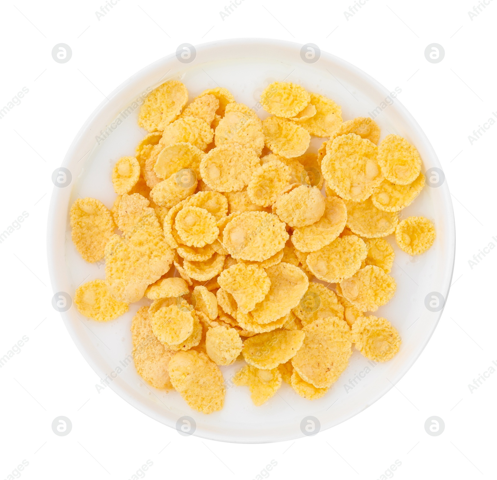 Photo of Breakfast cereal. Corn flakes and milk in bowl isolated on white, top view