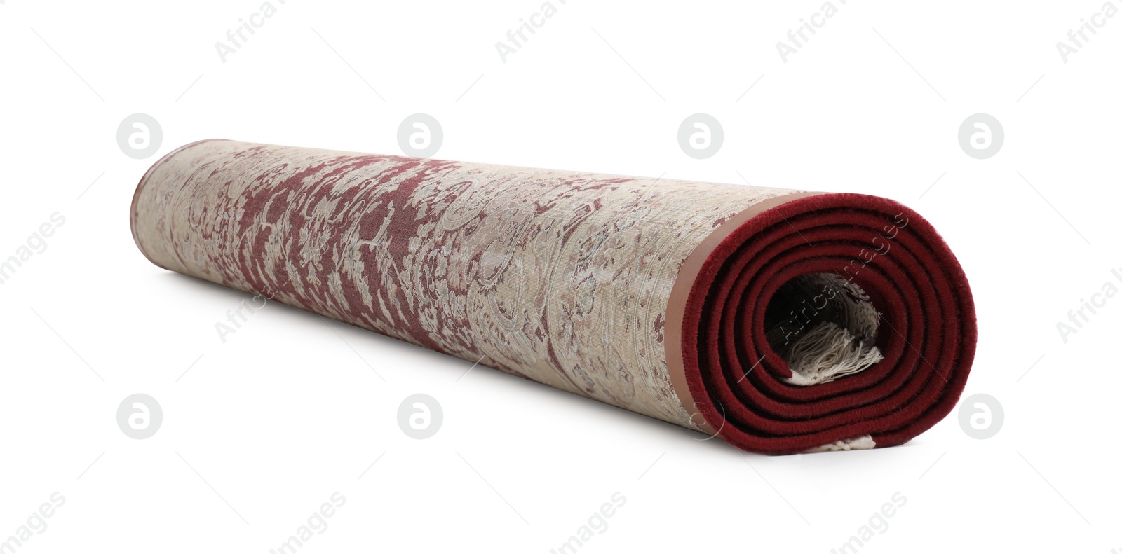 Photo of Rolled carpet on white background. Interior element