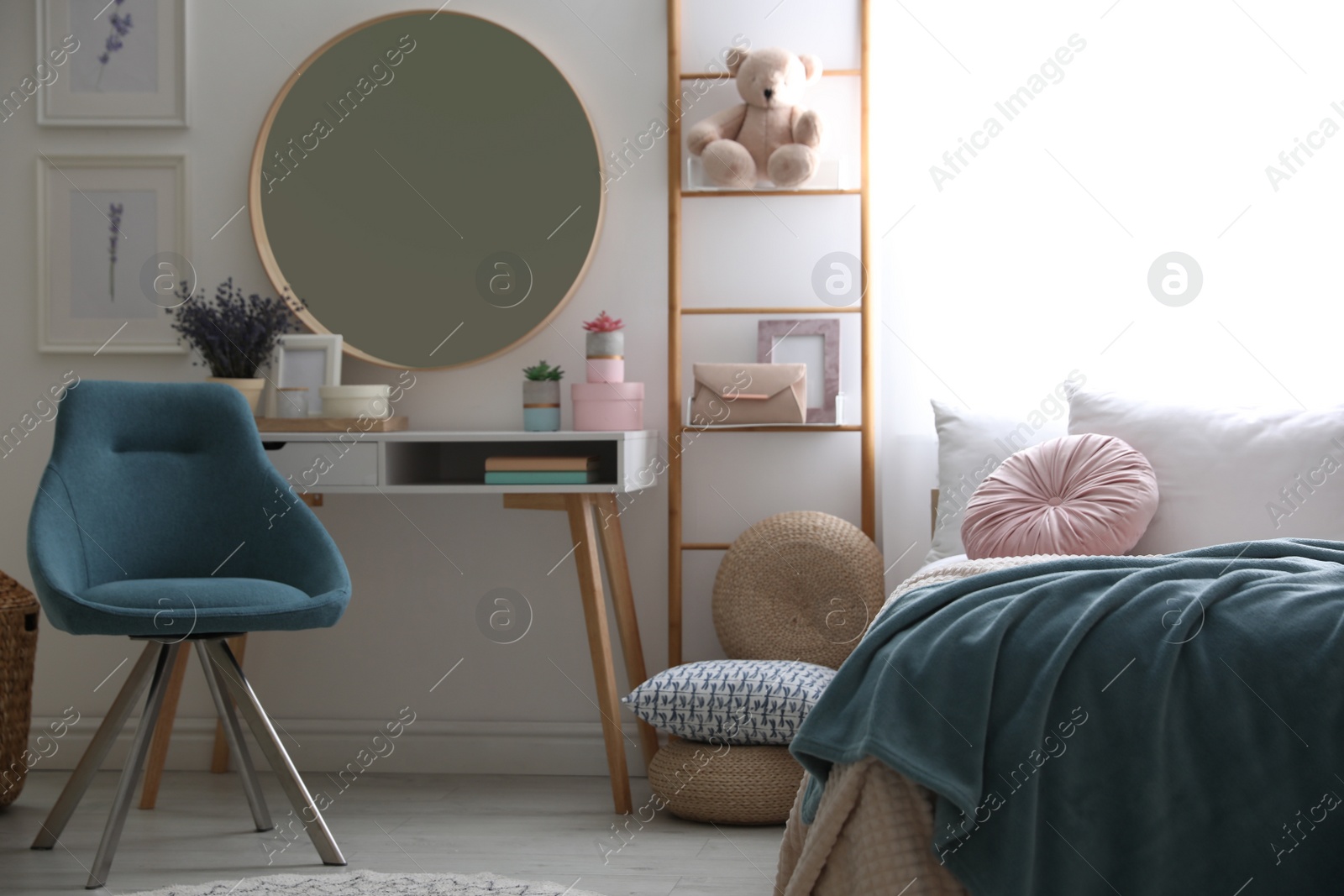 Photo of Teenage girl's bedroom interior with stylish furniture. Idea for design