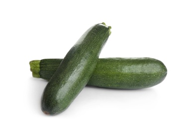 Fresh ripe green zucchinis isolated on white