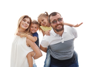 Happy family spending time together with their children outdoors