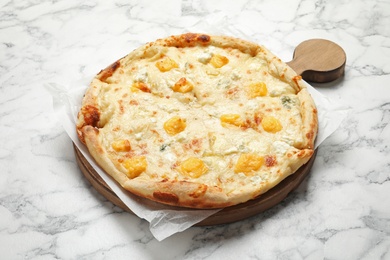 Photo of Hot cheese pizza Margherita on marble table