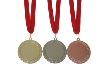Photo of Gold, silver and bronze medals isolated on white. Space for design