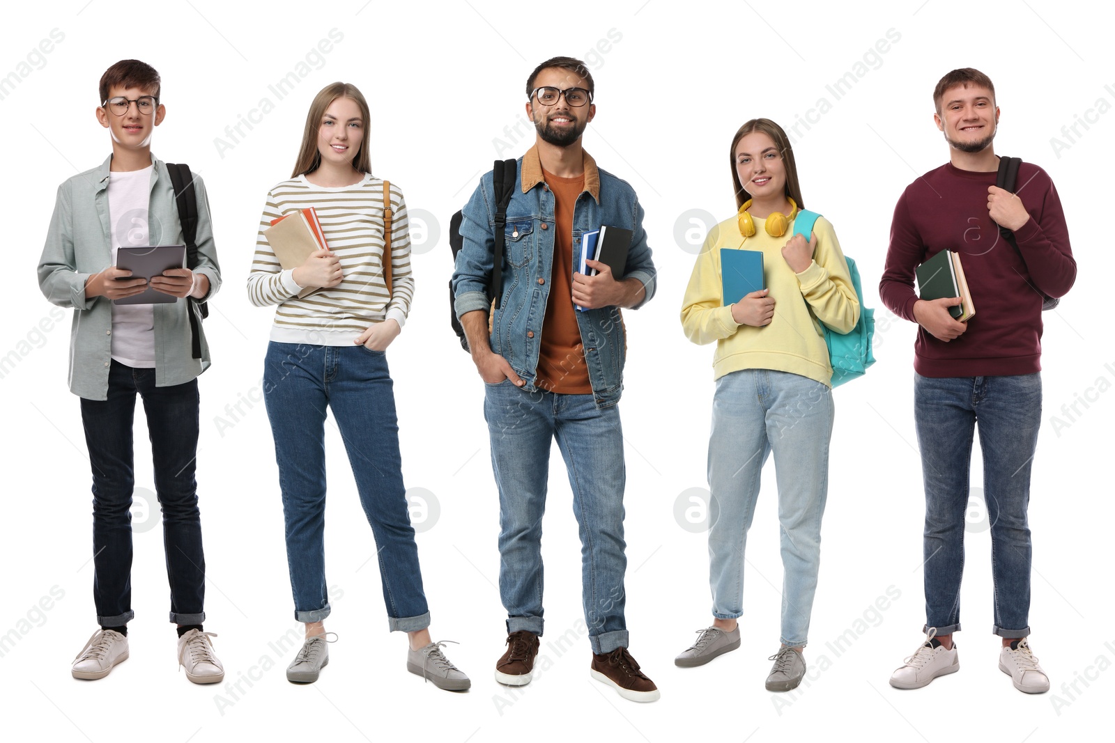 Image of Group of happy students with books on white background