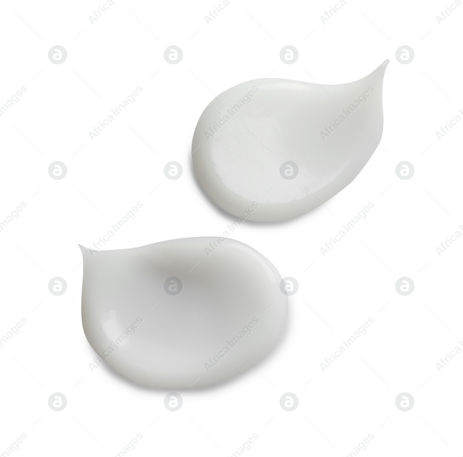 Photo of Samples of facial cream on white background, top view