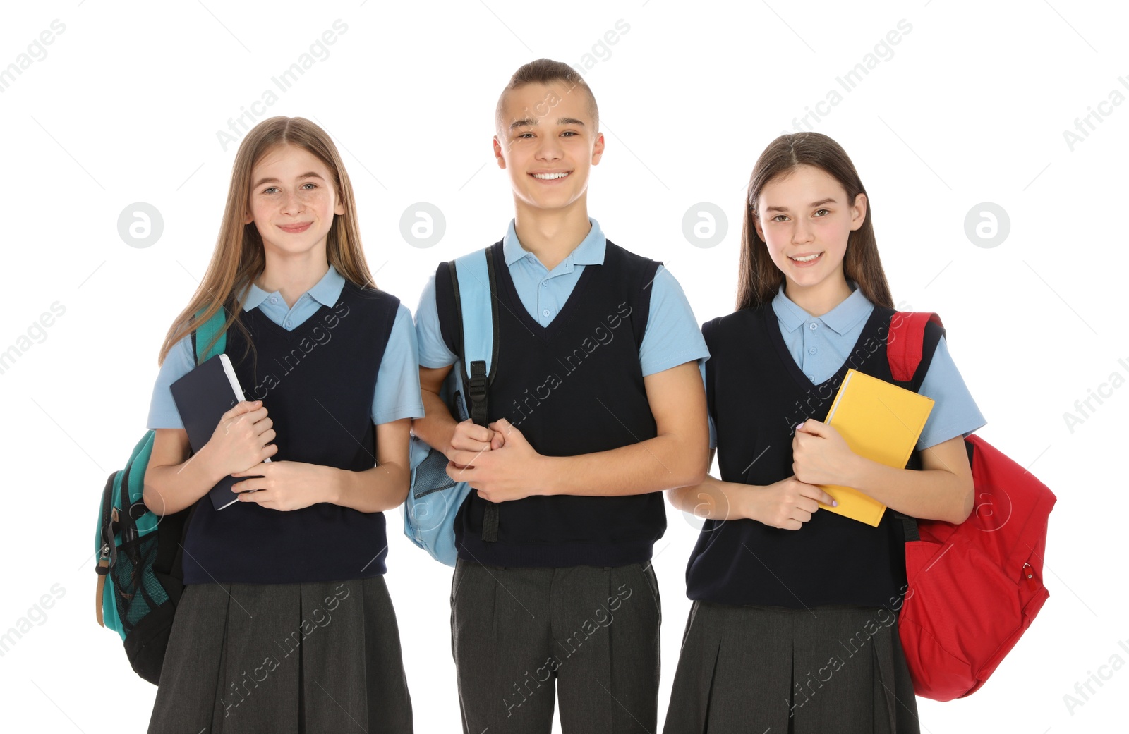 Photo of Portrait of teenagers in school uniform on white background