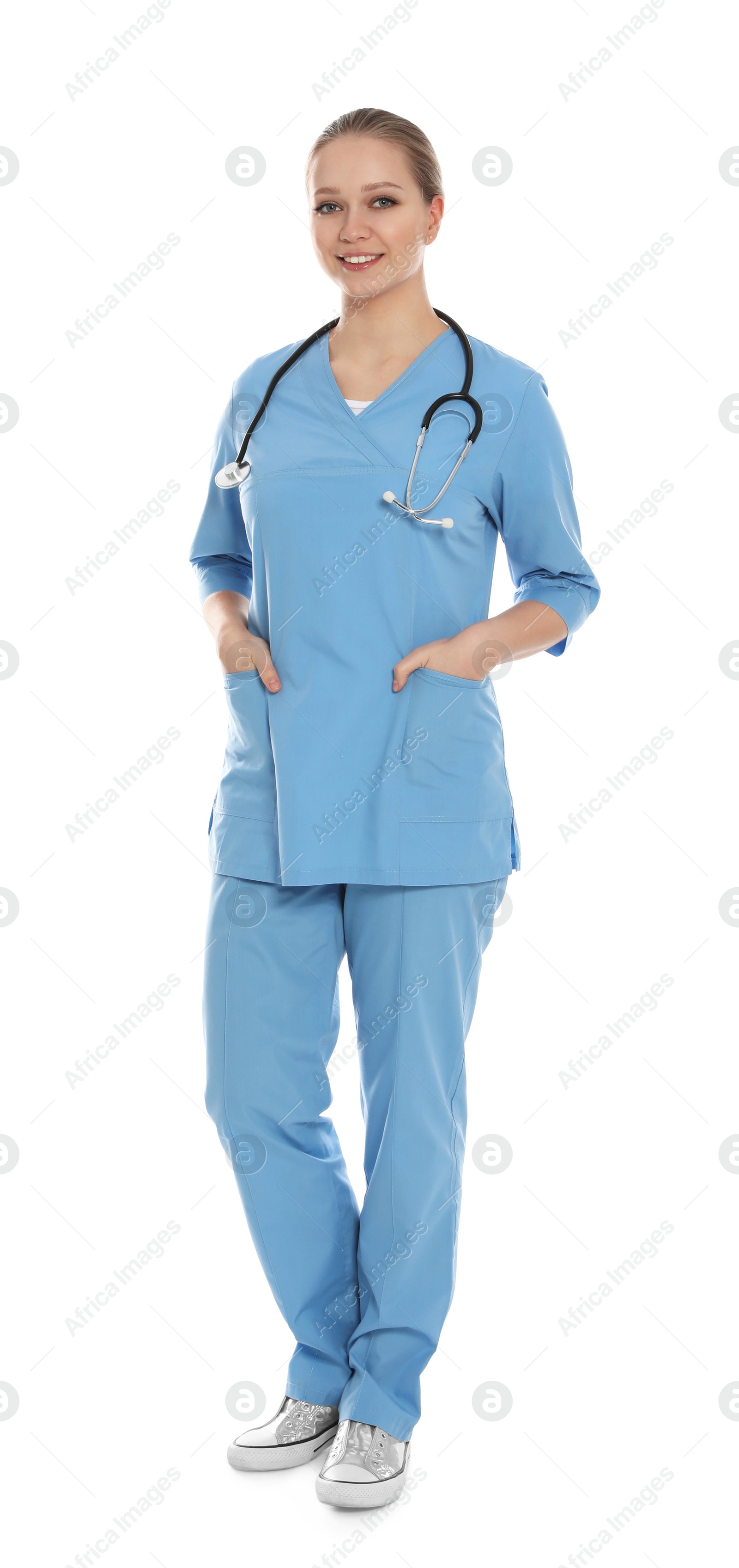 Photo of Full length portrait of medical doctor with stethoscope isolated on white