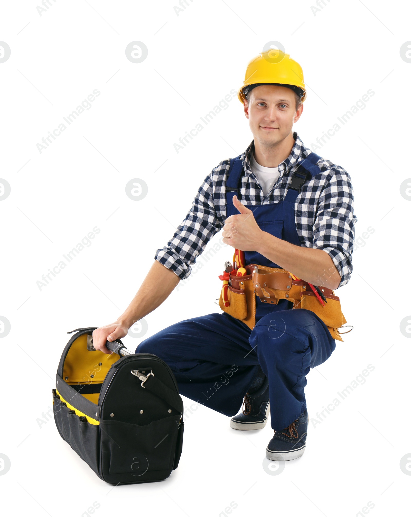 Photo of Electrician with tools wearing uniform on white background