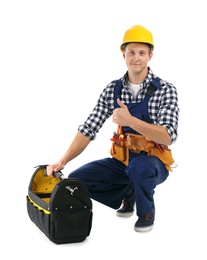 Electrician with tools wearing uniform on white background