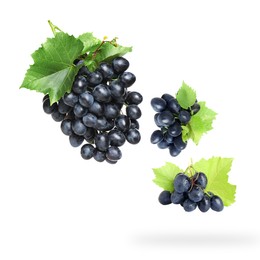 Image of Fresh grapes and leaves in air on white background