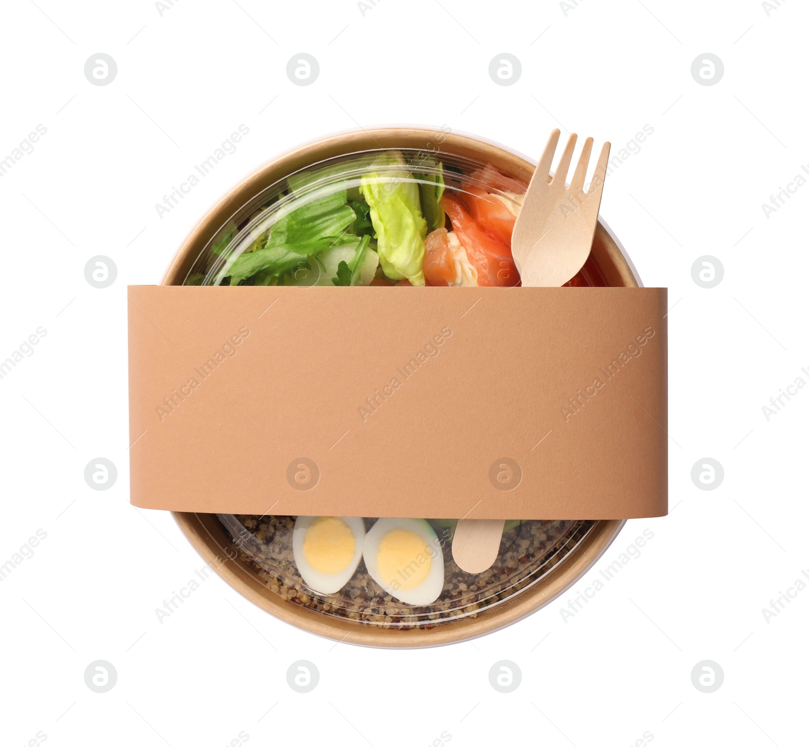 Photo of Tasty food in container with wooden fork isolated on white, top view