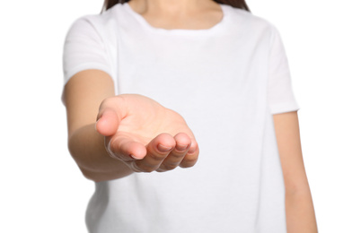 Photo of Woman against white background, closeup on hand