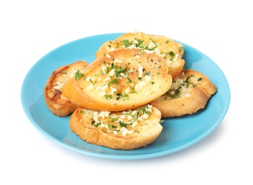 Plate with tasty homemade garlic bread isolated on white