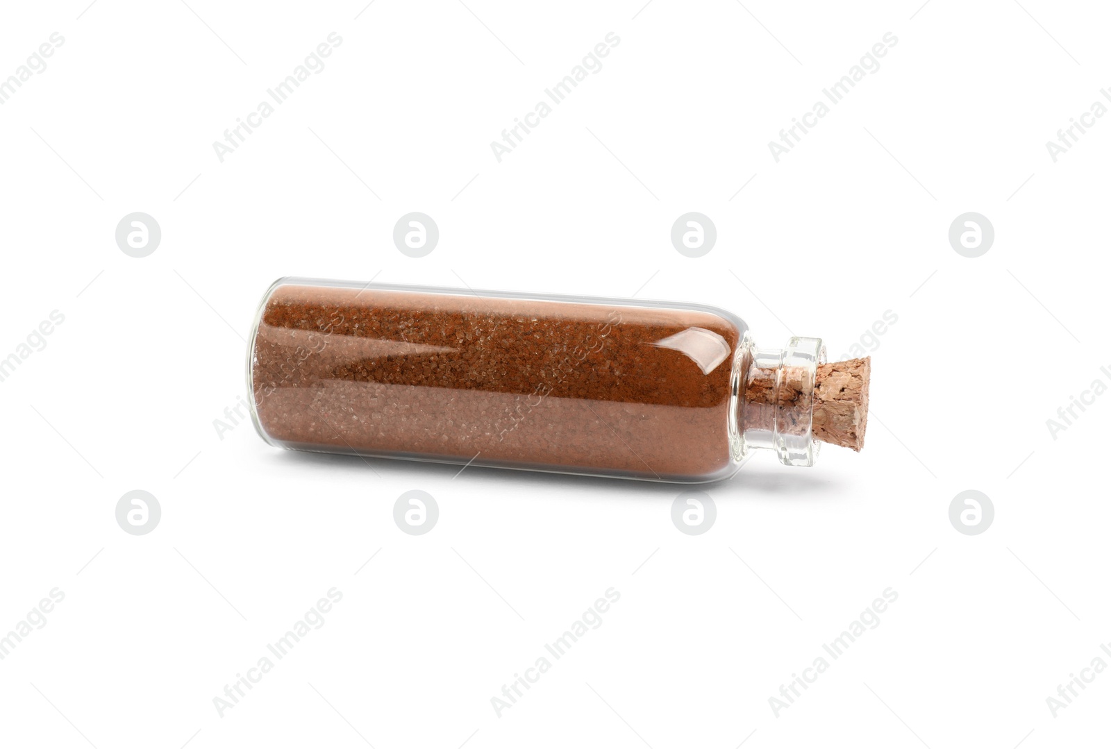 Photo of Glass bottle of brown food coloring isolated on white
